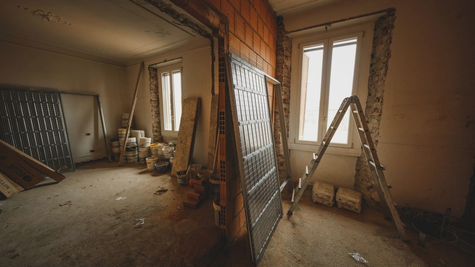 Drywall being hung during a residential remodel in Northwest Arkansas